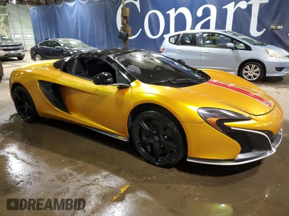 2015 McLaren 650S z VIN SBM11FAA0FW004199, wystawiony jako Copart lot #83836504 z przebiegiem 65 073 mil mil oraz Szkody całkowita. Historia ofert i sprzedaży dostępna na DreamBid. Obrazek 4.