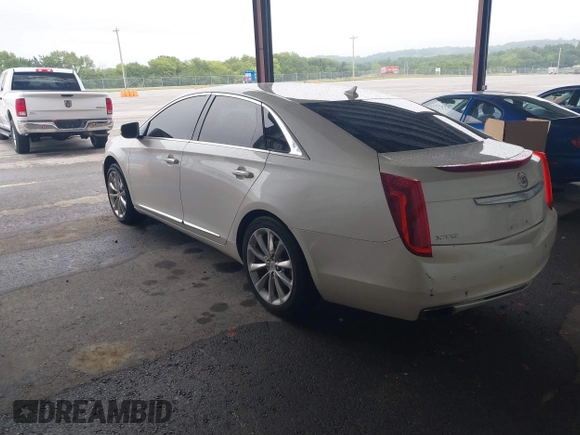 2014 Cadillac XTS Luxury with VIN 2G61M5S31E9210460, listed as a IAAI auction lot 41602087 with 1 mi miles. Bid and sale history available at carsss.com. Image 3.