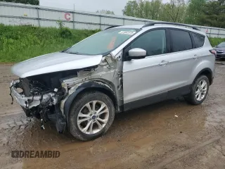 2017 Ford Escape SE z VIN 1FMCU0GDXHUE69106, wystawiony jako Copart lot #57852375 z przebiegiem 95 355 mil mil oraz Szkoda całkowita • Salvage title. Historia ofert i sprzedaży dostępna na DreamBid. Obrazek 1.