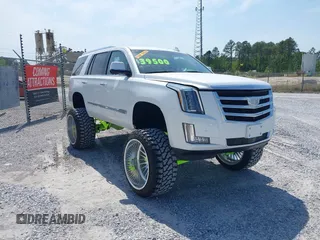 2020 Cadillac Escalade Luxury z VIN 1GYS3BKJ6LR124477, wystawiony jako IAAI lot #42042960 z przebiegiem 42 854 mil mil oraz . Historia ofert i sprzedaży dostępna na DreamBid. Obrazek 1.