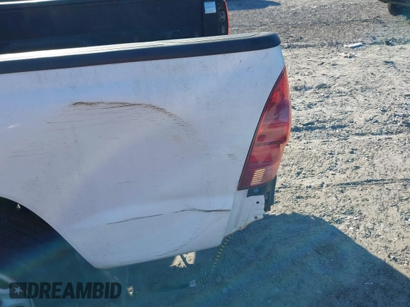 2014 Toyota Tacoma with VIN 5TFNX4CN9EX038101, listed as a IAAI auction lot 41487967 with 103,012 mi miles and . Bid and sale history available at DreamBid. Image 6.