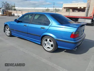 1997 BMW 3 Series with VIN WBSCD0325VEE10975, listed as a IAAI auction lot 41851847 with 209,106 mi miles and . Bid and sale history available at DreamBid. Image 3.