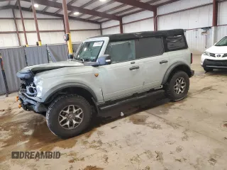 2021 Ford Bronco с VIN 1FMEE5DH6MLB02410, выставлен на аукционе Copart как лот 57070605 с пробегом 48 333 миль миль и Списание • Salvage title. История ставок и продаж доступна на DreamBid. Изображение 1.