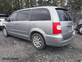 2016 Chrysler Town & Country Touring with VIN 2C4RC1BG4GR292735, listed as a IAAI auction lot 41931677 with 140,708 mi miles. Bid and sale history available at carsss.com. Image 3.
