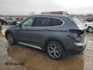2019 BMW X1 xDrive28i with VIN WBXHT3C58K5L97890, listed as a Copart auction lot 47076465 with 73,400 mi miles and Salvage title. Bid and sale history available at DreamBid. Image 2.