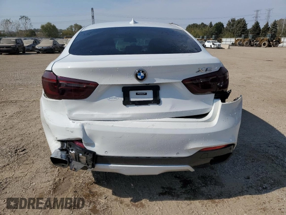 2018 BMW X6 xDrive50i with VIN 5UXKU6C56J0Z66652, listed as a Copart auction lot 74816694 with 56,229 mi miles and Salvage Title. Bid and sale history available at carsss.com. Image 6.