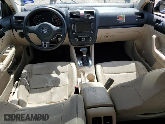 2010 Volkswagen Jetta SE with VIN 3VWRX7AJXAM049320, listed as a Copart auction lot 56142005 with 127,002 mi miles and Salvage title. Bid and sale history available at DreamBid. Image 8.