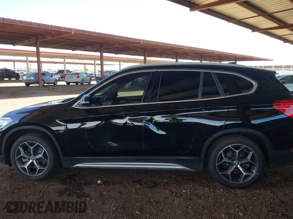 2018 BMW X1 sDrive28i z VIN WBXHU7C35J5L06673, wystawiony jako IAAI lot #42275787 z przebiegiem 61 204 mil mil oraz . Historia ofert i sprzedaży dostępna na DreamBid. Obrazek 14.
