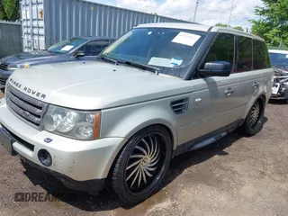 2006 Land Rover Range Rover Sport HSE z VIN SALSF25436A970841, wystawiony jako IAAI lot #42152175 z przebiegiem 254 024 mil mil oraz . Historia ofert i sprzedaży dostępna na DreamBid. Obrazek 2.