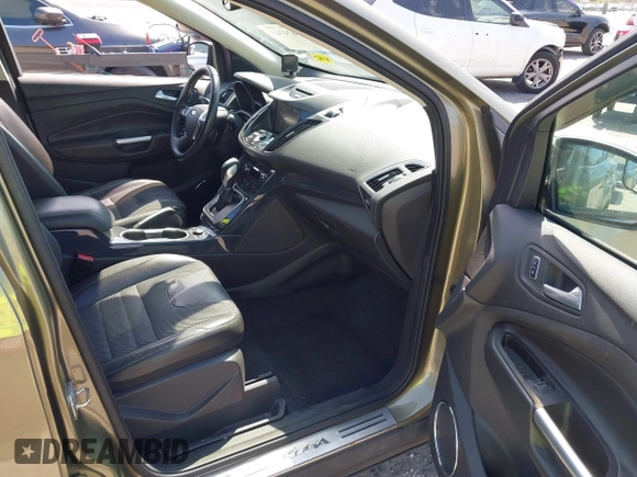 2013 Ford Escape Titanium with VIN 1FMCU0J94DUB06332, listed as a IAAI auction lot 41824742 with 92,633 mi miles. Bid and sale history available at carsss.com. Image 5.