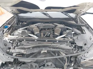 2021 BMW X6 M50i z VIN 5UXCY8C01M9E51506, wystawiony jako IAAI lot #41538726 z przebiegiem Nie podano mil oraz . Historia ofert i sprzedaży dostępna na DreamBid. Obrazek 10.