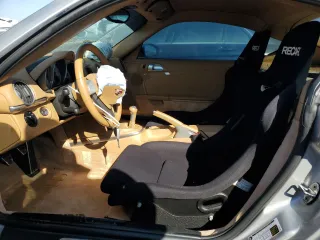 2007 Porsche Cayman S с VIN WP0AB29837U780257, выставлен на аукционе Copart как лот 68733494 с пробегом 164 227 миль миль и Списание • Salvage title. История ставок и продаж доступна на DreamBid. Изображение 7.