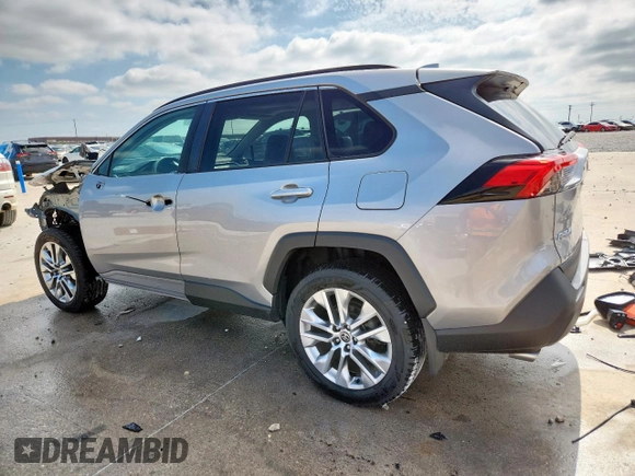 2021 Toyota RAV4 XLE Premium with VIN 2T3C1RFVXMC170581, listed as a Copart auction lot 58327005 with 54,200 mi miles and Salvage title. Bid and sale history available at DreamBid. Image 2.
