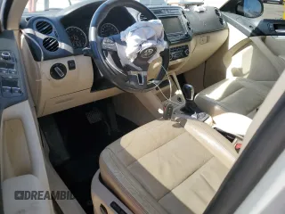 2012 Volkswagen Tiguan SEL with VIN WVGAV7AX9CW530331, listed as a Copart auction lot 50129405 with 141,387 mi miles and Salvage Title. Bid and sale history available at DreamBid. Image 8.