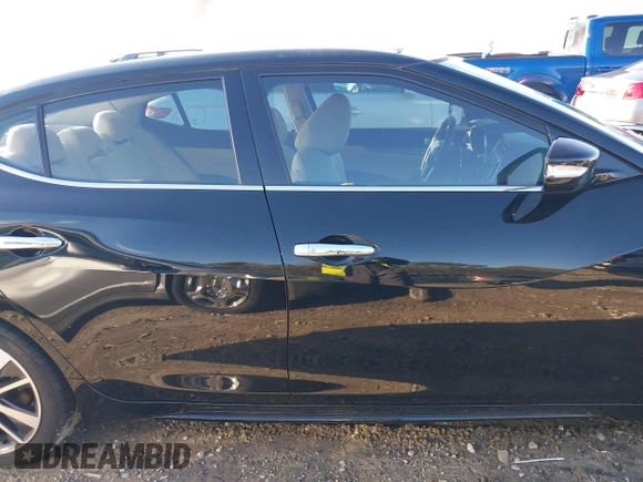 2019 Nissan Maxima Platinum z VIN 1N4AA6AV0KC379524, wystawiony jako IAAI lot #40862758 z przebiegiem 74 145 mil mil oraz . Historia ofert i sprzedaży dostępna na DreamBid. Obrazek 14.