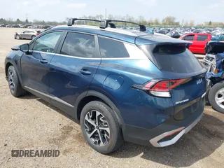 2023 Kia Sportage EX with VIN KNDPVCAGXP7104090, listed as a IAAI auction lot 42144158 with 26,983 mi miles and . Bid and sale history available at DreamBid. Image 3.