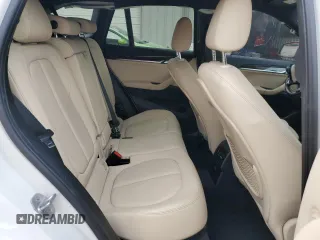 2017 BMW X1 sDrive28i with VIN WBXHU7C30H5H38049, listed as a Copart auction lot 51007915 with 52,963 mi miles and Salvage Title. Bid and sale history available at carsss.com. Image 11.