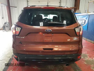 2018 Ford Escape SE z VIN 1FMCU9GD8JUC84420, wystawiony jako Copart lot #57386805 z przebiegiem 80 814 mil mil oraz Szkoda całkowita • Salvage title. Historia ofert i sprzedaży dostępna na DreamBid. Obrazek 6.