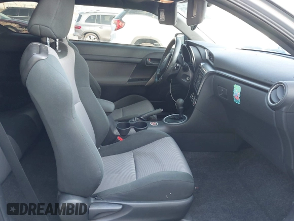 2014 Scion tC with VIN JTKJF5C7XE3079765, listed as a IAAI auction lot 41210220 with 114,410 mi miles. Bid and sale history available at carsss.com. Image 5.