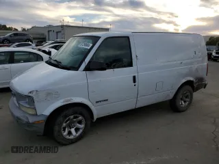 2001 GMC Safari Cargo with VIN 1GTDM19W71B510158, listed as a Copart auction lot 87296804 with 214,236 mi miles and Salvage Title. Bid and sale history available at carsss.com. Image 1.