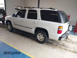 2004 GMC Yukon SLE z VIN 1GKEC13V64R107506, wystawiony jako IAAI lot #41407353 z przebiegiem 215 127 mil mil oraz . Historia ofert i sprzedaży dostępna na DreamBid. Obrazek 3.