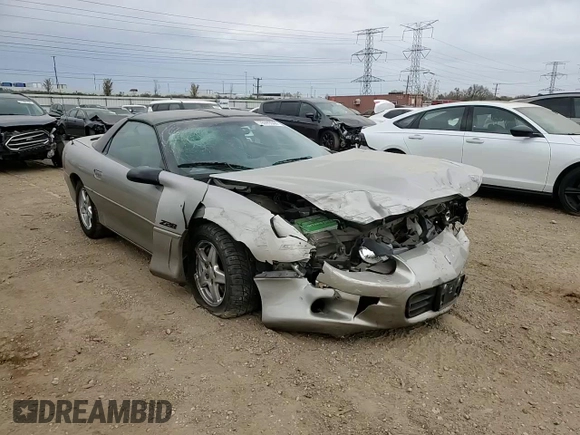 1999 Chevrolet Camaro Z28 z VIN 2G1FP22G2X2136787, wystawiony jako Copart lot #76599644 z przebiegiem 47 740 mil mil oraz Szkoda całkowita • Salvage title. Historia ofert i sprzedaży dostępna na DreamBid. Obrazek 11.