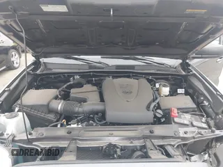 2023 Toyota Tacoma SR z VIN 3TYSZ5AN7PT106205, wystawiony jako IAAI lot #42084290 z przebiegiem 7123 mil mil oraz . Historia ofert i sprzedaży dostępna na DreamBid. Obrazek 10.