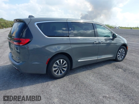 2022 Chrysler Pacifica Hybrid Limited z VIN 2C4RC1S71NR144989, wystawiony jako IAAI lot #40735375 z przebiegiem 61 361 mil mil oraz . Historia ofert i sprzedaży dostępna na DreamBid. Obrazek 4.