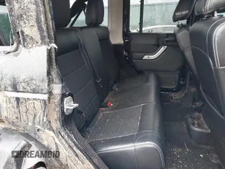 2012 Jeep Wrangler Unlimited Call of Duty MW3 z VIN 1C4BJWFG0CL202238, wystawiony jako IAAI lot #41956648 z przebiegiem 92 572 mil mil oraz . Historia ofert i sprzedaży dostępna na DreamBid. Obrazek 8.