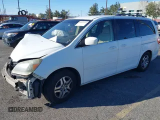 2006 Honda Odyssey EX z VIN 5FNRL38486B410286, wystawiony jako IAAI lot #41641433 z przebiegiem 145 312 mil mil oraz . Historia ofert i sprzedaży dostępna na DreamBid. Obrazek 2.