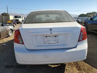 2004 Suzuki Forenza S z VIN KL5JD52Z14K950658, wystawiony jako Copart lot #74824154 z przebiegiem 99 150 mil mil oraz Tytuł czysty. Historia ofert i sprzedaży dostępna na DreamBid. Obrazek 6.