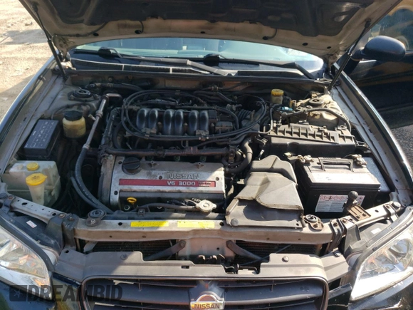 2000 Nissan Maxima GXE z VIN JN1CA31D9YT522233, wystawiony jako Copart lot #63989294 z przebiegiem 238 554 mil mil oraz Szkoda całkowita • Salvage title. Historia ofert i sprzedaży dostępna na DreamBid. Obrazek 12.