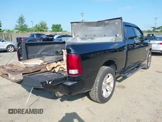 2014 Ram 1500 Sport with VIN 1C6RR7UT2ES136028, listed as a IAAI auction lot 42716600 with 119,148 mi miles and . Bid and sale history available at DreamBid. Image 4.