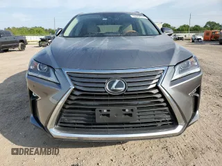 2019 Lexus RX 350 z VIN 2T2ZZMCA9KC129707, wystawiony jako Copart lot #52202615 z przebiegiem 69 868 mil mil oraz Szkoda całkowita • Salvage title. Historia ofert i sprzedaży dostępna na DreamBid. Obrazek 5.