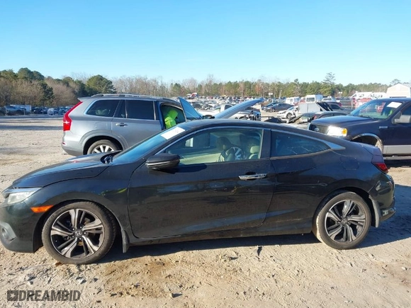 2016 Honda Civic Coupe Touring with VIN 2HGFC3B96GH357012, listed as a IAAI auction lot 41295294 with NaN miles. Bid and sale history available at carsss.com. Image 15.