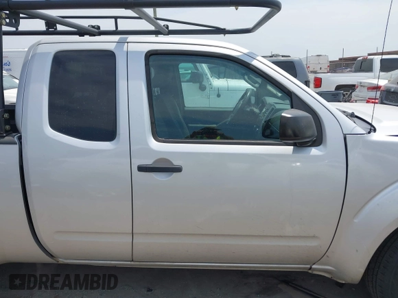 2014 Nissan Frontier SV with VIN 1N6AD0CUXEN768602, listed as a IAAI auction lot 42074514 with 77,469 mi miles and . Bid and sale history available at DreamBid. Image 14.