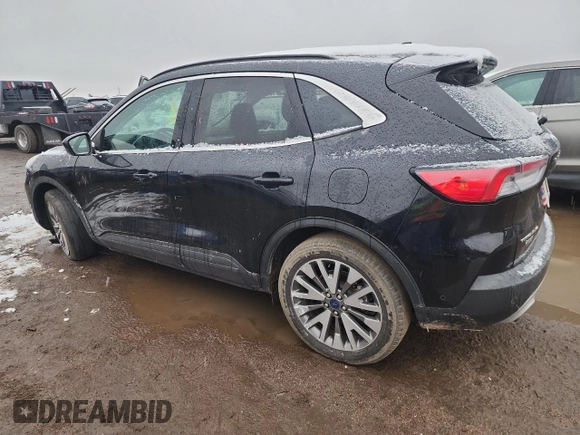 2021 Ford Escape Titanium Hybrid with VIN 1FMCU0DZ7MUA37521, listed as a Copart auction lot 79881664 with 64,996 mi miles and Clean title. Bid and sale history available at DreamBid. Image 2.