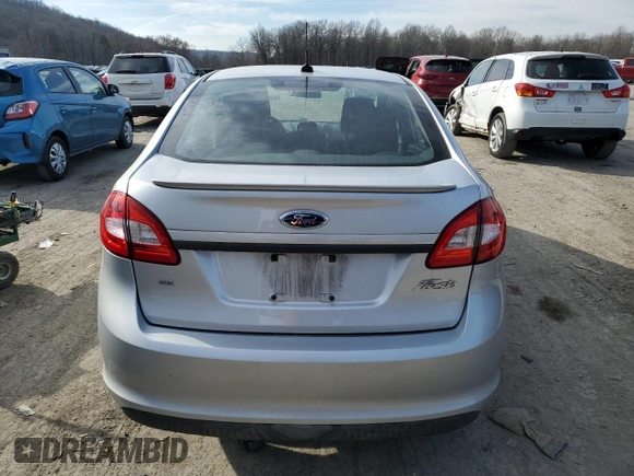 2012 Ford Fiesta SE with VIN 3FADP4BJ9CM121045, listed as a Copart auction lot 47297575 with 83,785 mi miles and Salvage Title. Bid and sale history available at DreamBid. Image 6.