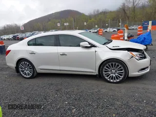 2014 Buick LaCrosse Premium II with VIN 1G4GF5G31EF234190, listed as a IAAI auction lot 42017022 with 125,376 mi miles. Bid and sale history available at carsss.com. Image 13.