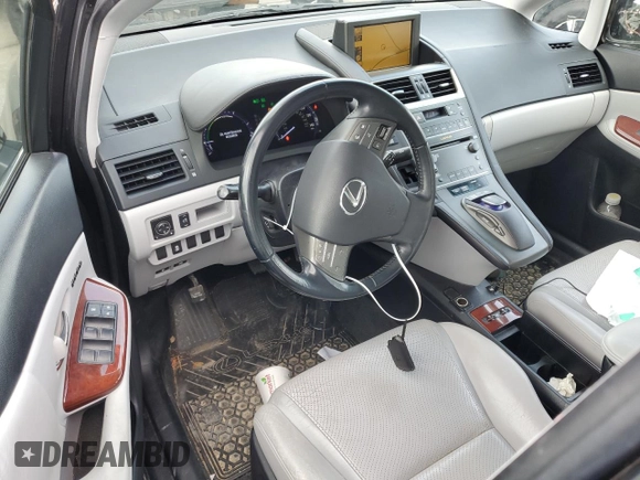 2010 Lexus HS 250h with VIN JTHBB1BA2A2013125, listed as a Copart auction lot 79688744 with 197,625 mi miles and Salvage Title. Bid and sale history available at DreamBid. Image 8.