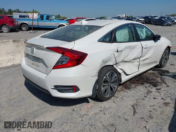 2018 Honda Civic EX-L z VIN 19XFC1F70JE000634, wystawiony jako IAAI lot #42020912 z przebiegiem 156 030 mil mil oraz . Historia ofert i sprzedaży dostępna na DreamBid. Obrazek 4.