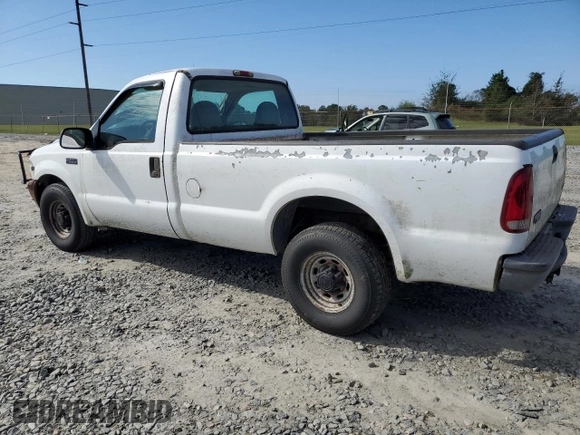 2002 Ford Super Duty F-250 XL with VIN 1FTNF20L22ED69572, listed as a Copart auction lot 80442804 with 218,461 mi miles and Salvage Title. Bid and sale history available at carsss.com. Image 2.