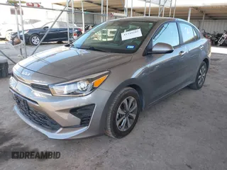 2023 Kia Rio S with VIN 3KPA24AD1PE579816, listed as a IAAI auction lot 41349202 with 5,784 mi miles. Bid and sale history available at carsss.com. Image 2.