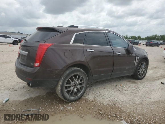 2015 Cadillac SRX Performance Collection with VIN 3GYFNCE38FS571733, listed as a Copart auction lot 54946215 with 147,343 mi miles and Salvage title. Bid and sale history available at DreamBid. Image 3.