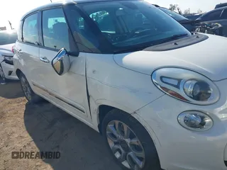 2014 FIAT 500L Lounge with VIN ZFBCFACH9EZ004041, listed as a IAAI auction lot 41366234 with 106,769 mi miles and . Bid and sale history available at DreamBid. Image 6.