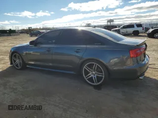 2015 Audi A6 Prestige z VIN WAUHGAFC2FN006252, wystawiony jako Copart lot #80515204 z przebiegiem 131 466 mil mil oraz Szkoda całkowita • Salvage title. Historia ofert i sprzedaży dostępna na DreamBid. Obrazek 2.