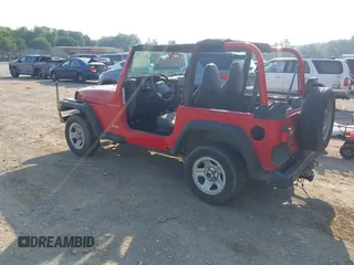 2000 Jeep Wrangler SE with VIN 1J4FA29P6YP775127, listed as a IAAI auction lot 42377387 with Not provided miles and . Bid and sale history available at DreamBid. Image 3.