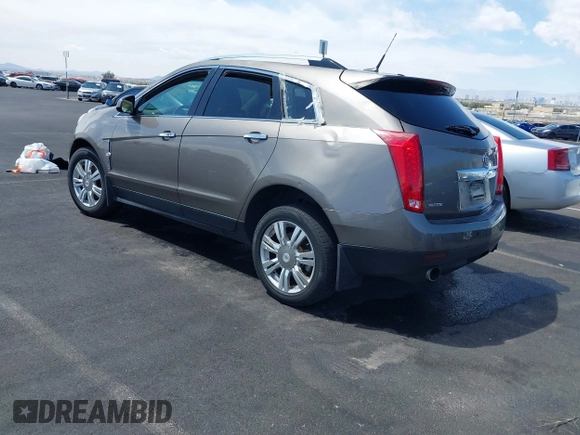 2012 Cadillac SRX Luxury Collection with VIN 3GYFNAE30CS612453, listed as a IAAI auction lot 42048235 with 173,982 mi miles and . Bid and sale history available at carsss.com. Image 3.