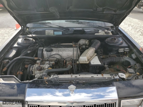 1985 Chrysler LeBaron Mark Cross with VIN 1C3BC55E0FG160918, listed as a Copart auction lot 76659284 with NaN miles and Salvage Title. Bid and sale history available at carsss.com. Image 11.