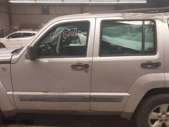 2009 Jeep Liberty Sport with VIN 1J8GN28K19W552594, listed as a IAAI auction lot 41582040 with 146,606 mi miles. Bid and sale history available at carsss.com. Image 14.